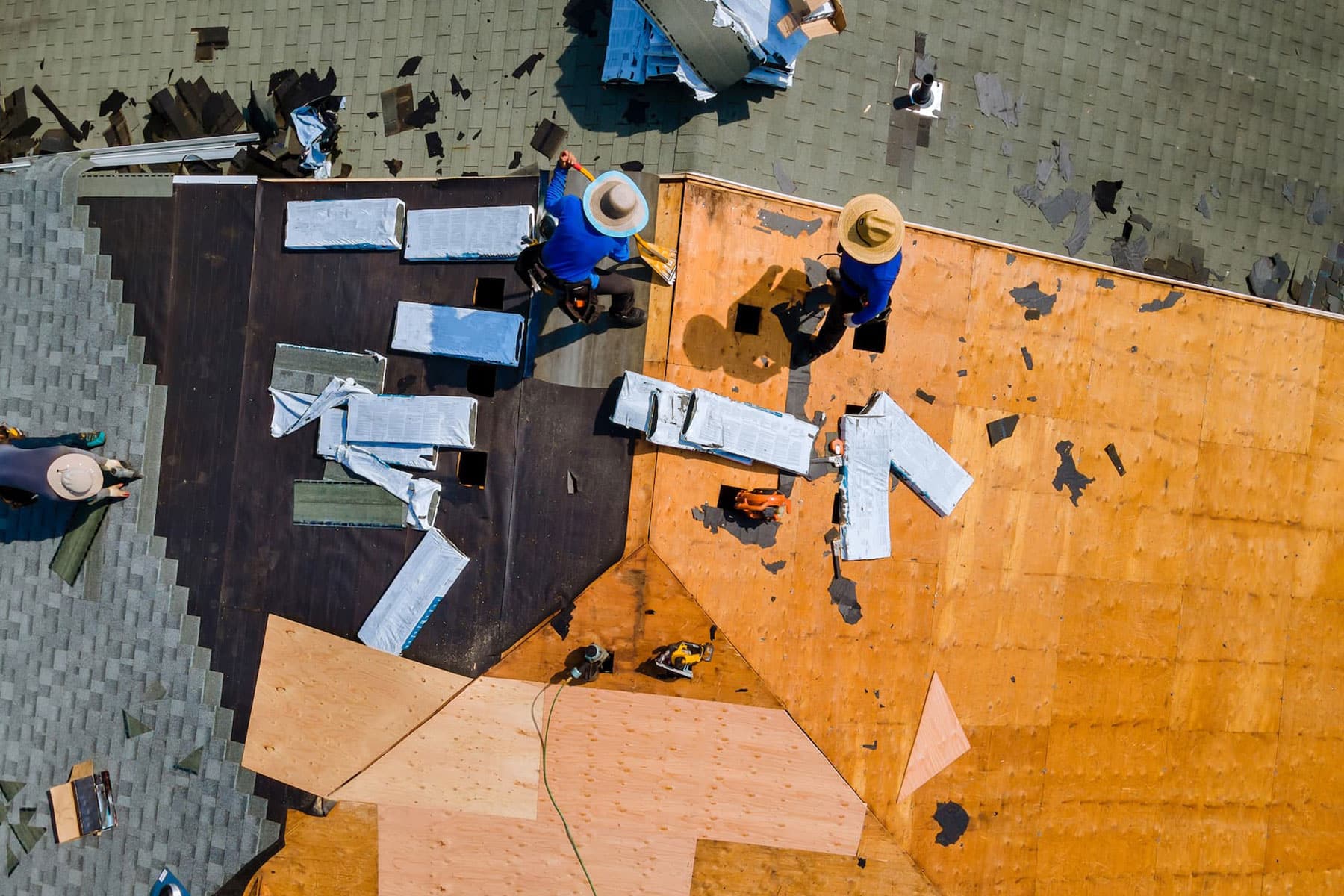 workers working on a roof in Florida