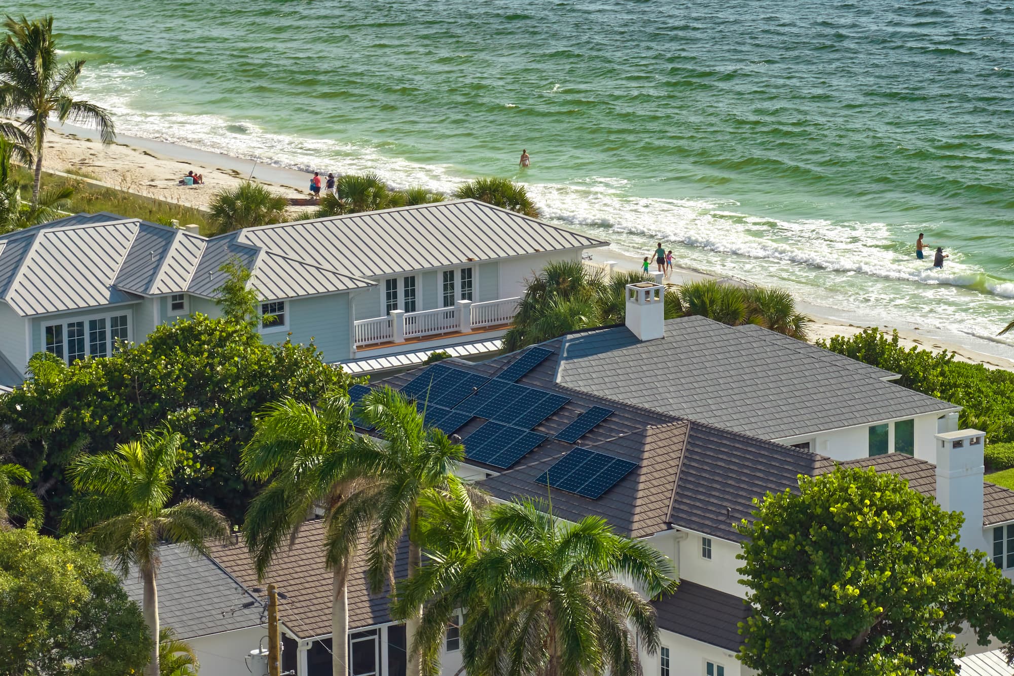 a house in front of a beach in Florida